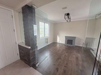 2 frameless glass doors