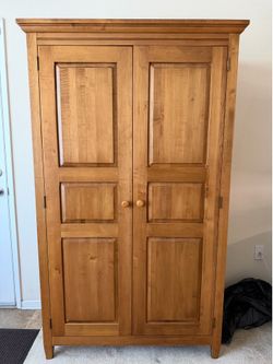 Solid wood tall wardrobe/cabinet