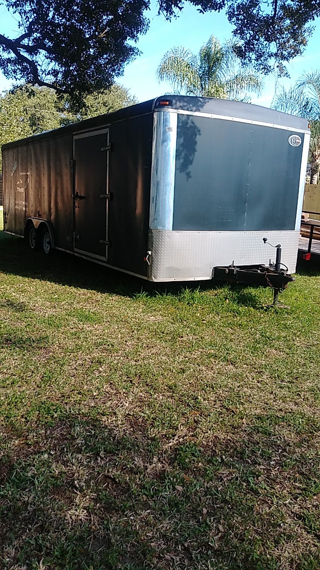 26' enclosed trailer with drop down back door.