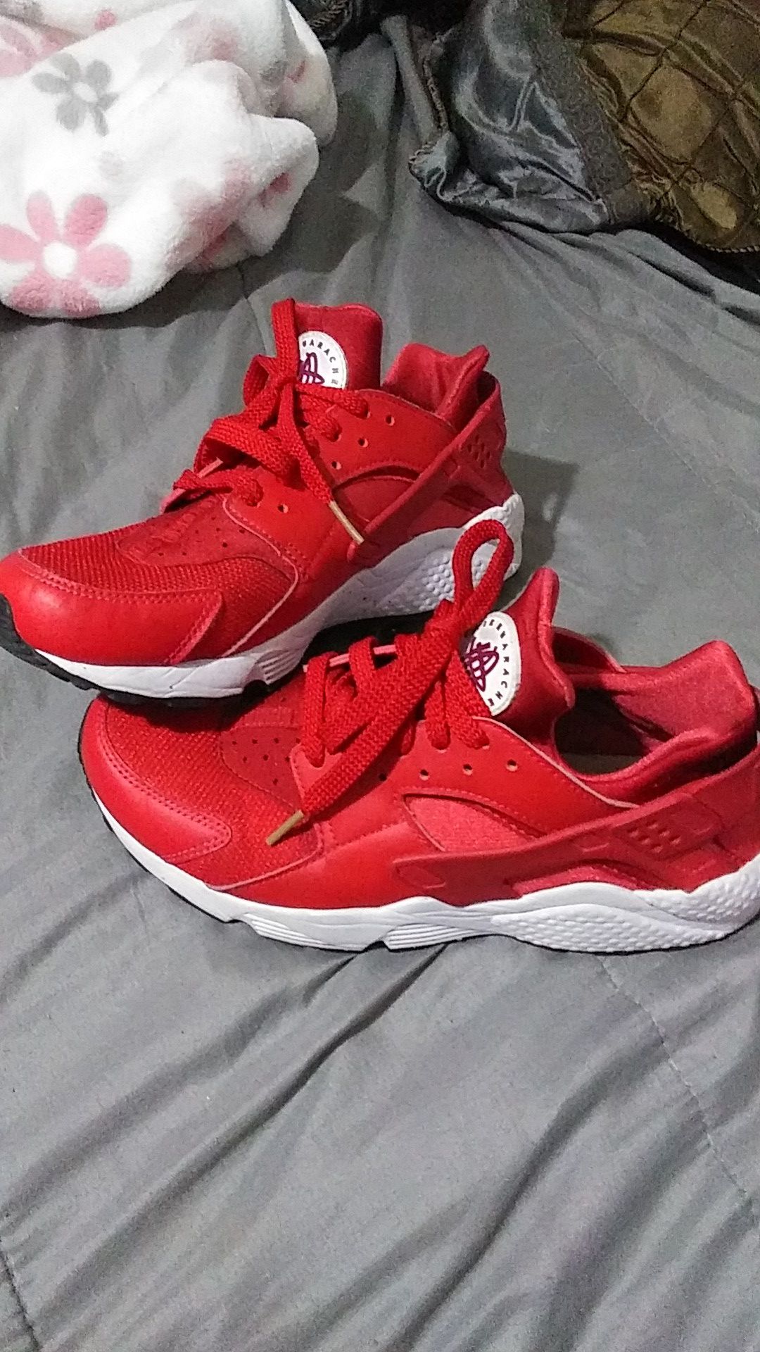 Red and white Nike Air Hurraches