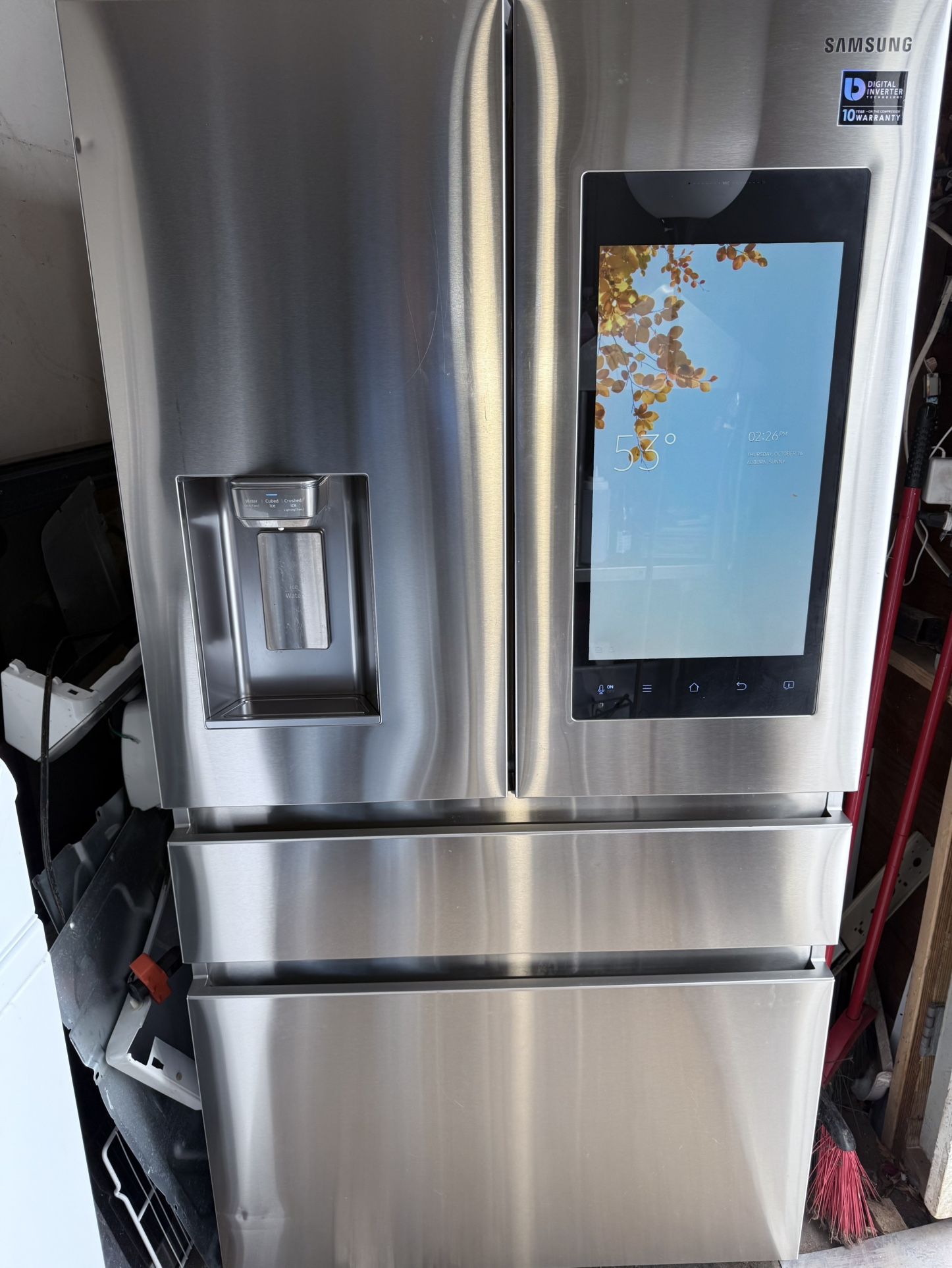 Samsung refrigerator with touchscreen, Wi-Fi, and Bluetooth connection.