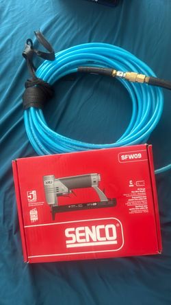 Staple gun with air hose