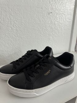 TENNIS COACH