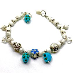 Sterling & Turquoise Skulls Charm Bracelet by Rock n Roll Hearts. 8”