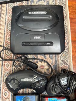 Sega genesis,with cords.2 controller and 2 games