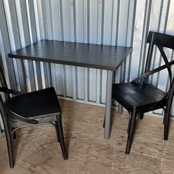 2 Chairs And A Table 