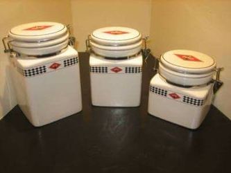 Coca cola canisters in box