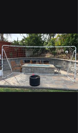 Metal soccer goal posts and net