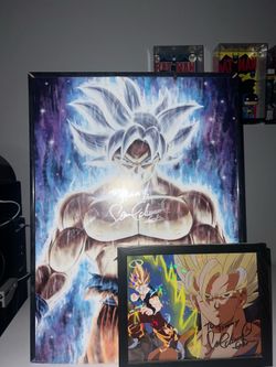 Signed Goku posters