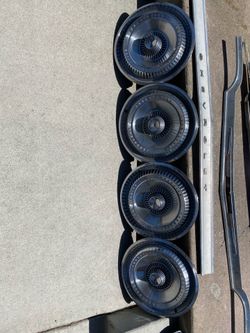 15” (4) thunderbird hub caps ! Clean