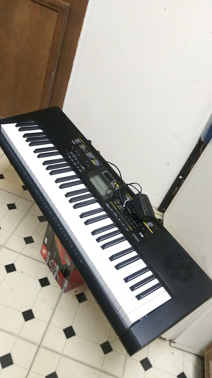 61 KEY CASIO PIANO KEYBOARD. USED ONLY ONE TIME. STILL IN NEW CONDITION.