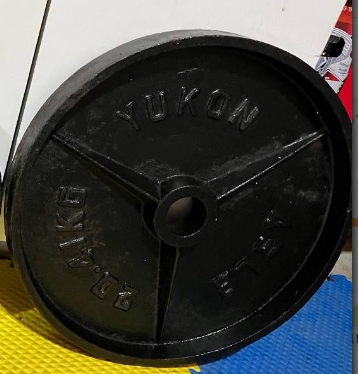 PAIR OF YUKON OLYMPIC 45lb WEIGHT PLATES