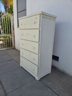 Tall dresser 51"H. x 32"W. x 17"D.