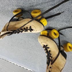 Suede Quad Roller Skates..Size 8 women's, size 6.5 mens