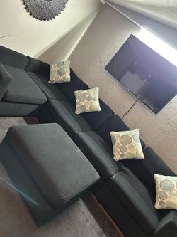 Black Sectional Sofa With Ottoman