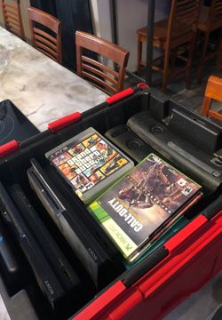 4 game consoles (2 PS3s & 2 Xbox 360s)