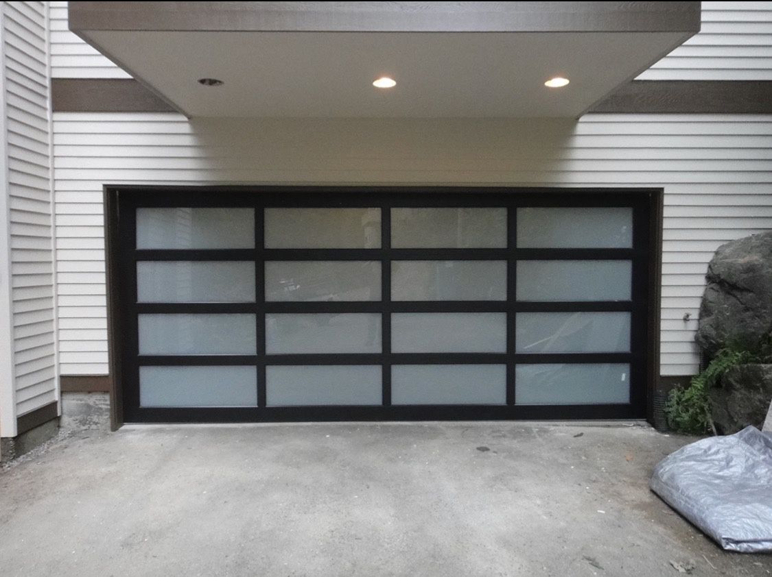 Garage Door, Anodized Black Aluminum With Insulated Satin Etched Glass, 16’ Wide 7’ Tall.