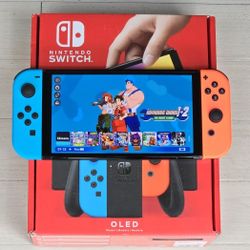 NINTENDO SWITCH OLED  200 TOP GAMES + 25000 RETROS  + MOVIES