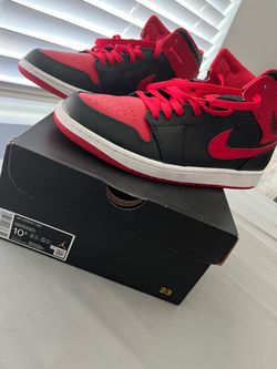 Jordan ‘s mid  Black Fire Red and White