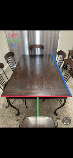 Solid wood, rustic table would table and chairs