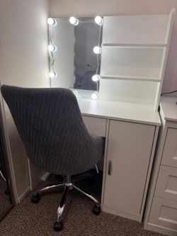 Vanity table including chair