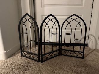 Metal cathedral tea light holder
