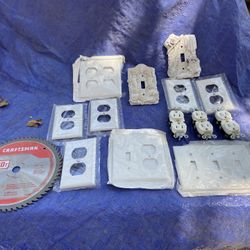 Electric Plugs And Wall Covers And Saw Blade