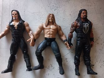 Undertaker Edge and Roman Reigns