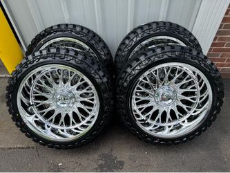 NEW 22x12 mirror chrome fittipaldi wheels wrapped in 33x12.50r22 atturo MT tires