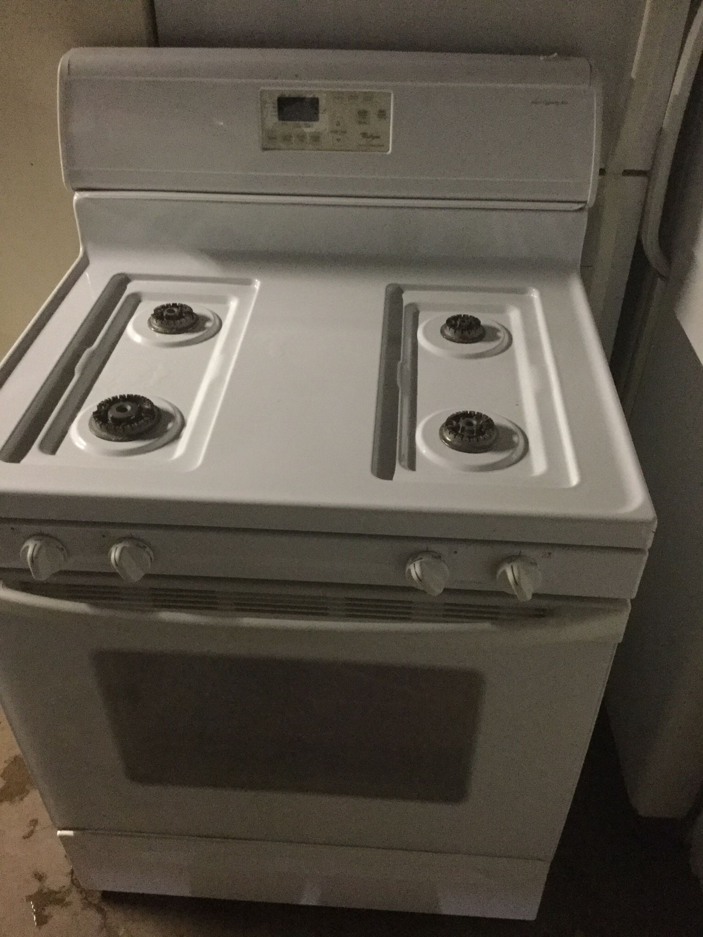 Whirlpool spectra gas stove/ all accessories included but not in photo/ one year warranty