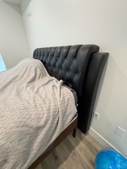 Queen bed, spring box, and mattress + Black Tufted Faux Leather Headboard,