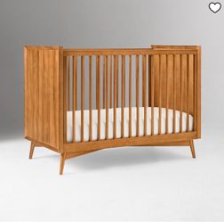 Mid century crib with a toddler attachment