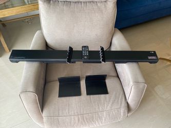 Wireless sound bar LG con soportes de pared incluido
