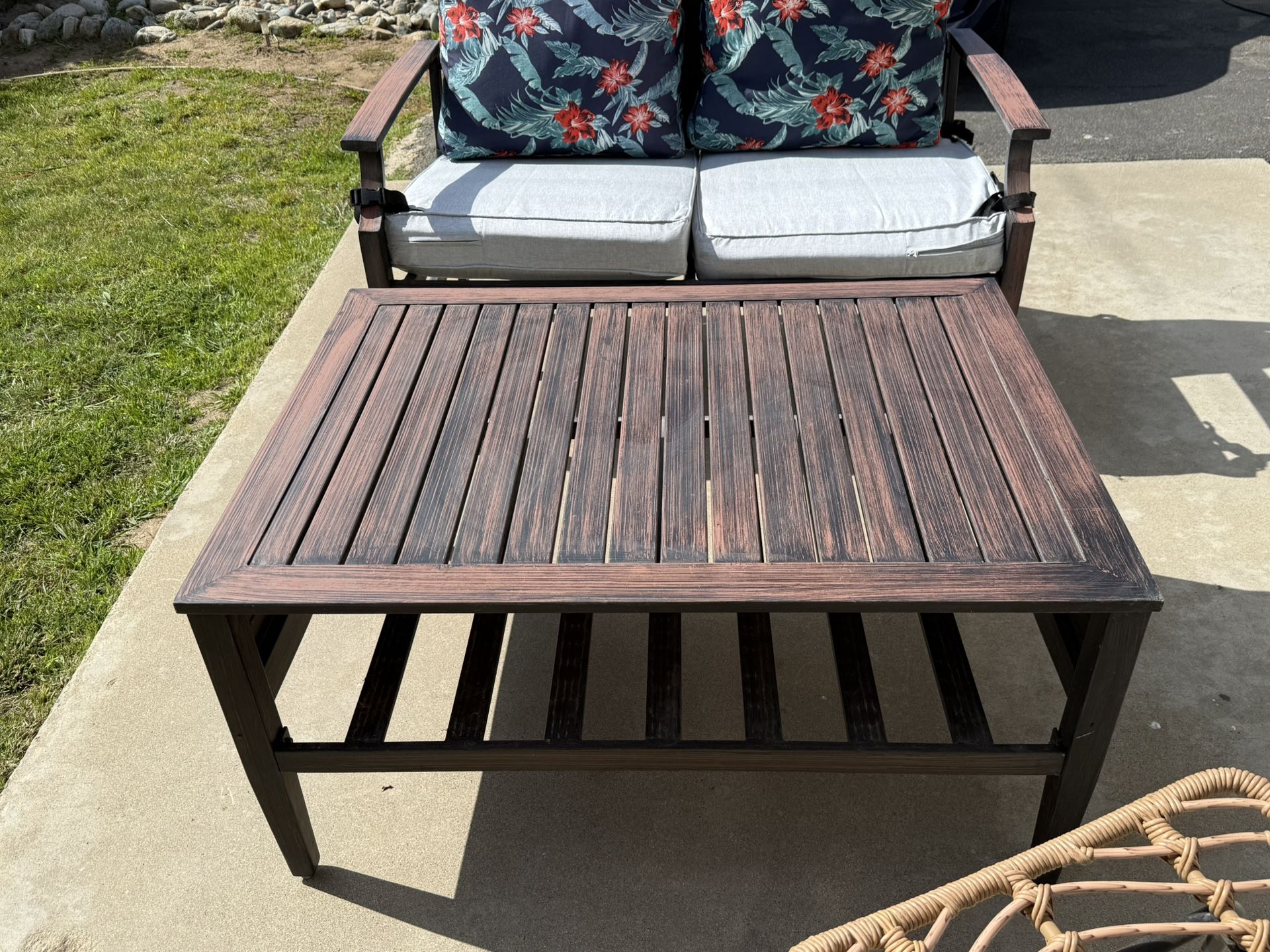 Outdoor loveseat with cushions, matching table, two wicker rattan chairs - like new quality