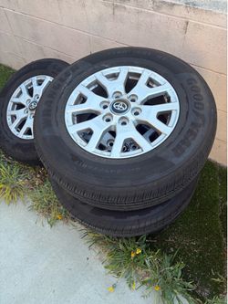 2024-2026 Tacoma oem rims and tires practically new