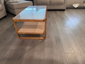 Natural wood table with glass top