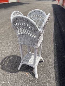 Antique white wicker plant stand