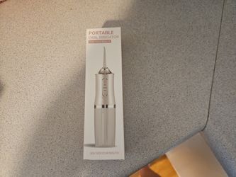 Portable Oral Irragator Brand New In Box