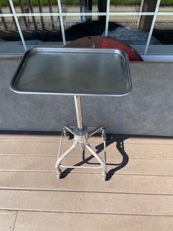 Stainless steel, rolling table. 