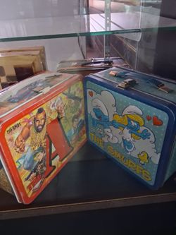A-team & Smurfs lunch boxes ..