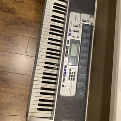 Casio Piano Keyboard LK-100, 61 Keys, 100 Song Bank, 50 Rhythms 
