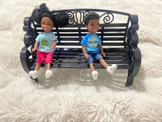 Toy, doll and bench