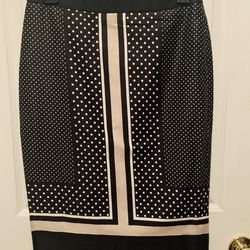 Polka dot Skirt size 2 New without tags. 98% Cotton, With Linen, Black & Ivory. 29 inches waist, 37 inches hips, 23 inches long.  Comes from a smoke f