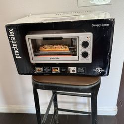  Proctor Silex 4-Slice Toaster Oven Broiler, model number 31260.  
