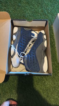 Nike Air Jordan 13 Retro "Flint" sneakers in the Navy/Carolina Blue/Flint Grey/White colorway.