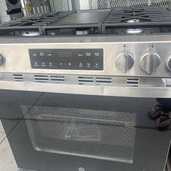 GE Slide In Gas Stove, You Can Also Convert It To Propane.  