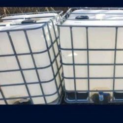 Large 250 gallon storage tanks