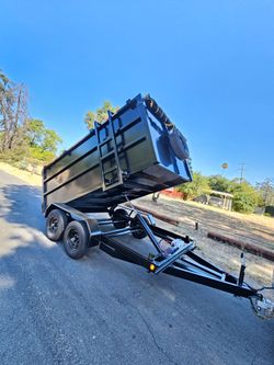 NEW DUMP TRAILER 8X12X4 12000 LBS
ROLLING TARP--SPARE TIRE,ELECTRIC BRAKES,HYDRAULIC SYSTEM,REMOTE CONTROL,IDEAL FOR HAULING, DEMOLITION, TRASH ETC,FO