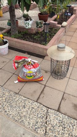BIRD FEEDER AND BIRD FOOD