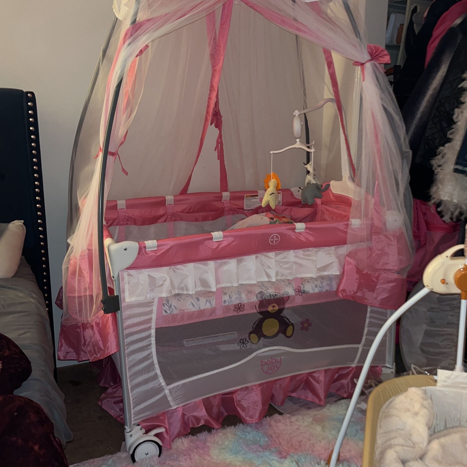 BABY JOY 4 in 1 Pack and Play, Portable Baby Playard with Bassinet, Adjustable Canopy, Changing Table, Lockable Wheels, Music Box, Travel Baby Crib Ba